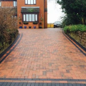 Red block paving with black double border - Stoneway Paving